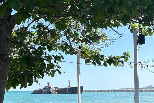 The sea and the Costinești shipwreck, seen from a terrace